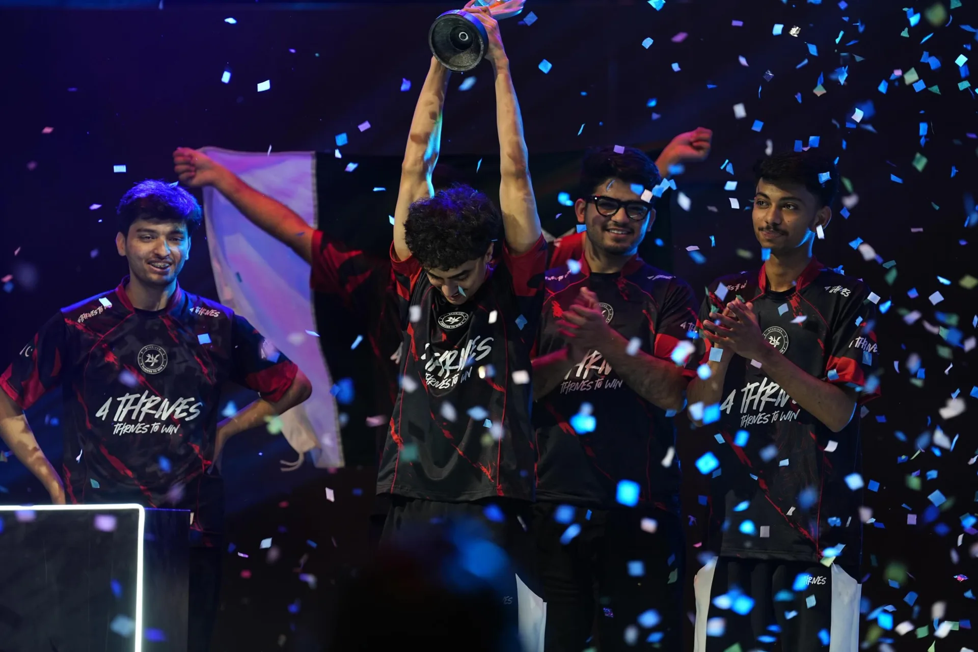 4Thrives Esports lifting the trophy at the PMGO 2026 South Asia Finals in Lahore